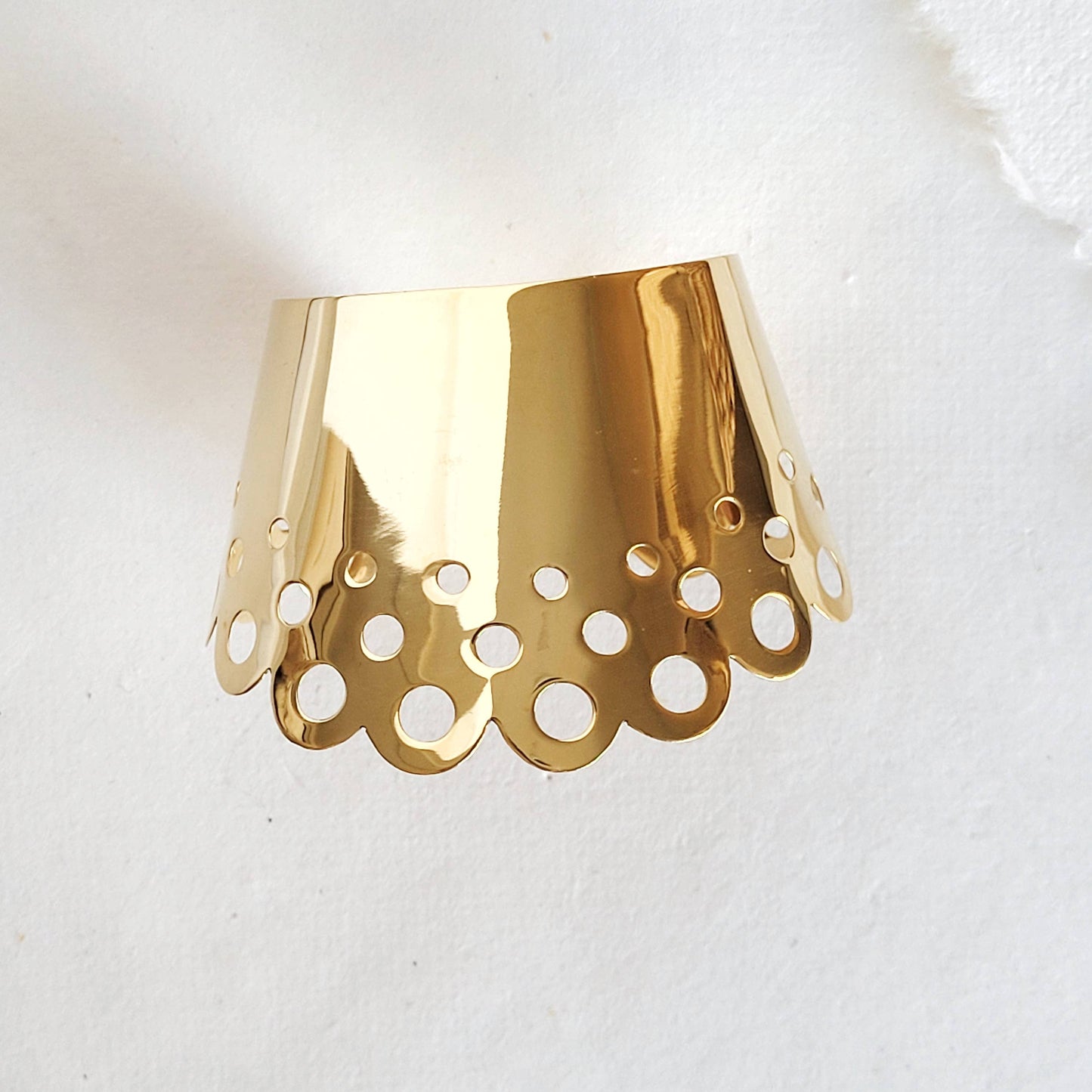 Brass scallop cuff with small circle cutouts