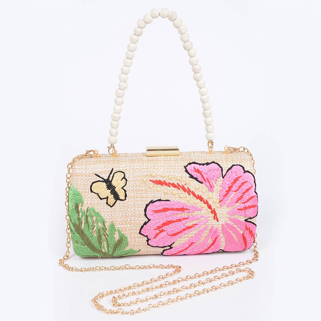 raffia bag with wooden bead handle and floral butterfly embrodery with gold shoulder chain