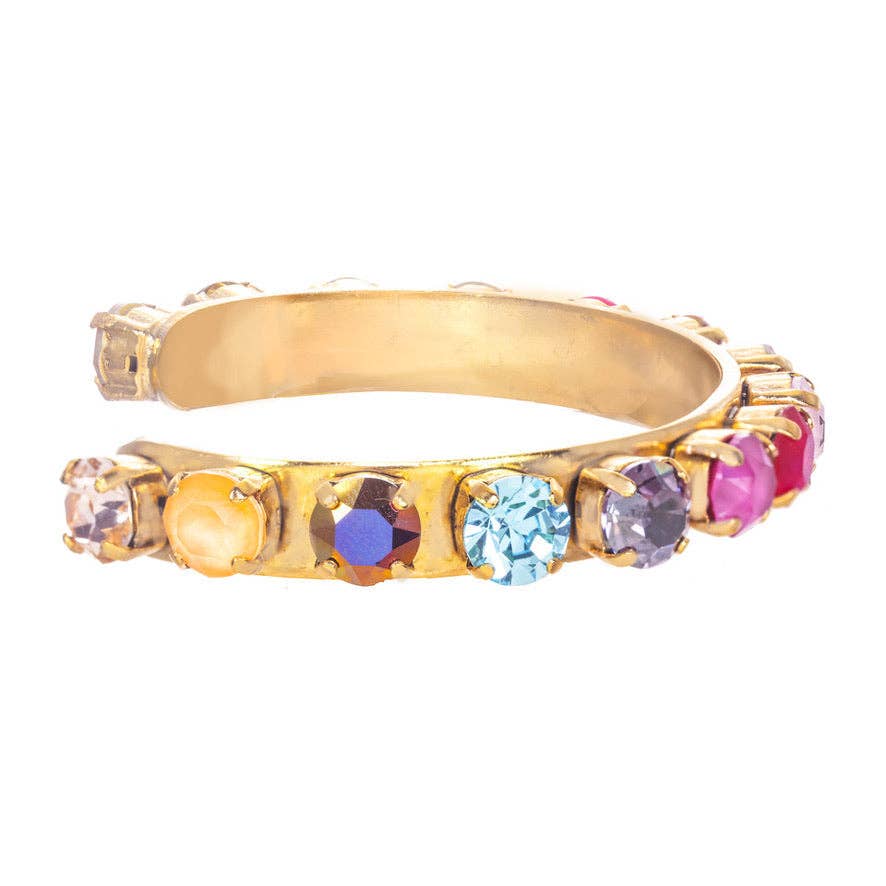 side view of gold cuff bracelet with multi colored crystals