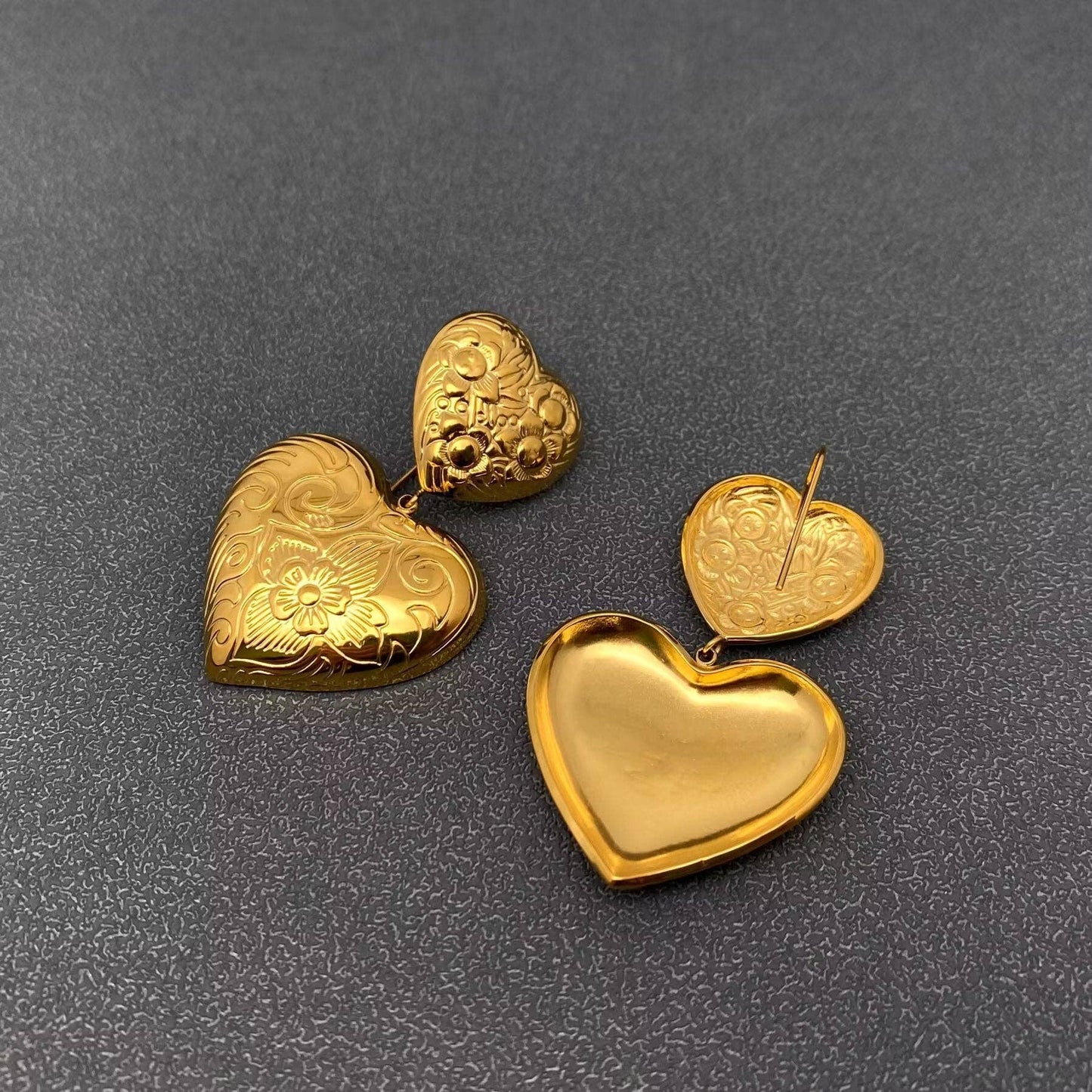 front and back view of pair of gold embossed double heart earrings