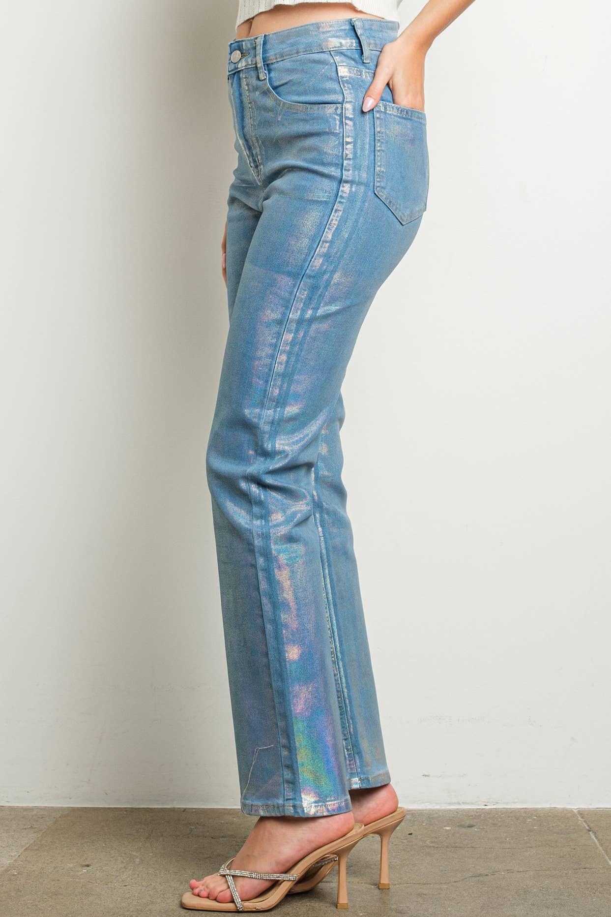 Side view is of iridescent jeans