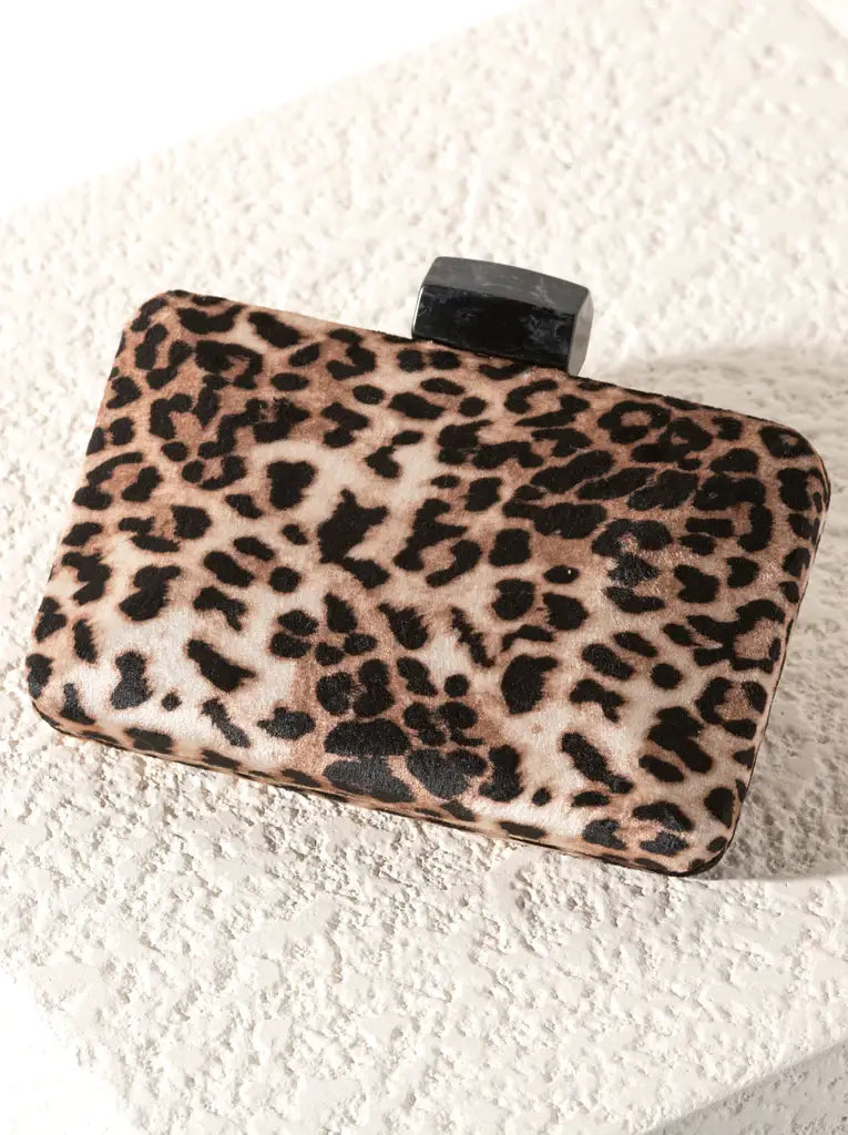 leopard print clutch bag with black resin closure
