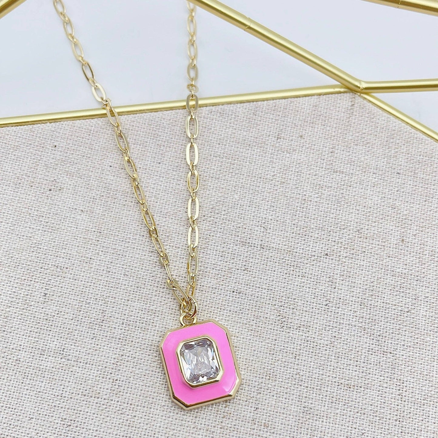 rectangular pink enamel and center crystal necklace on gold chain