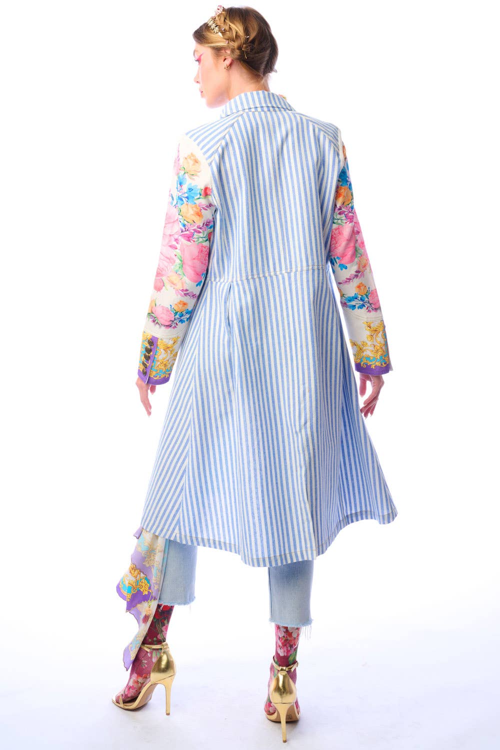 Back view of striped floral sleeve coat showing contrast print sleeves against a white background