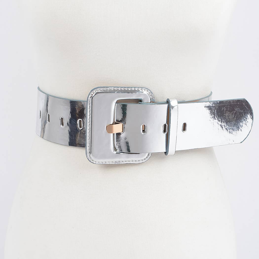 A silver colored wide mirror belt with a square buckle, displayed on a mannequin against a white background