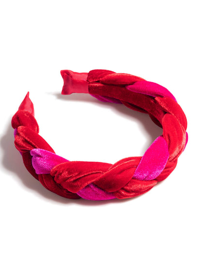 Pink & red velvet headband against a white background