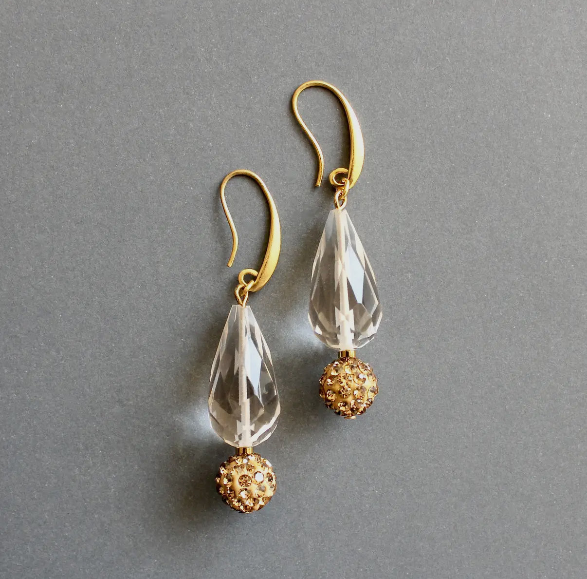 A pair of crystal and topaz colored glass earrings