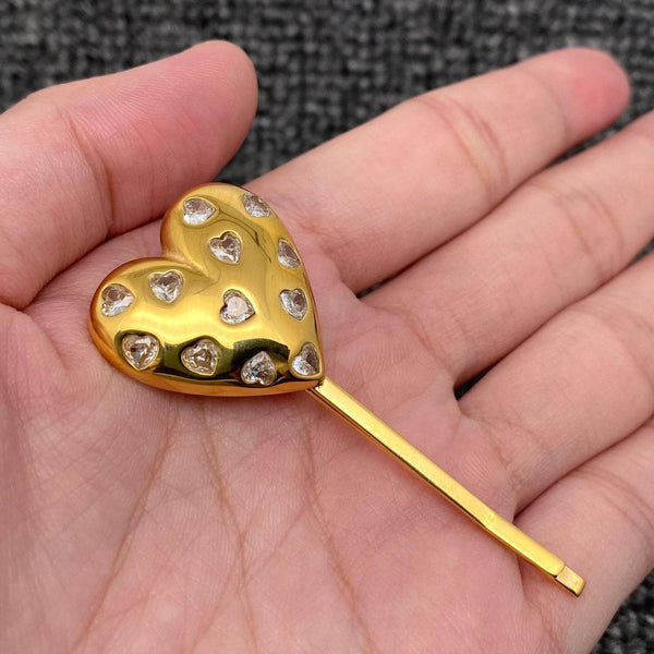 gold heart hair pin with rhinestone embellishments