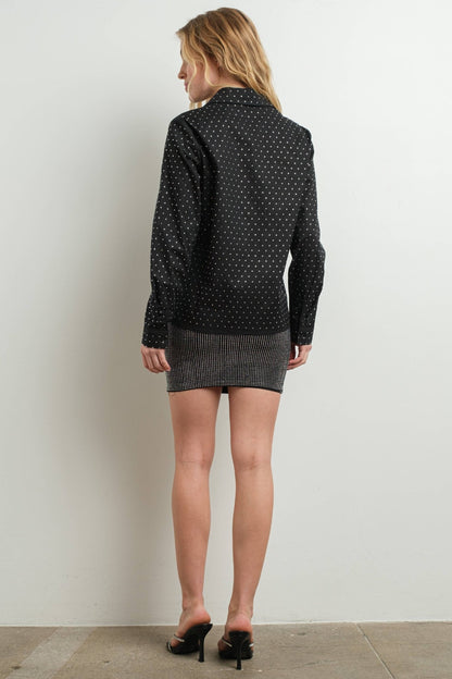 Black rhinestone cotton blouse on woman with skirt