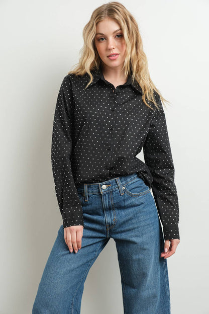 Black rhinestone embellished cotton blouse on woman with jeans