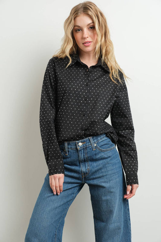Black rhinestone embellished cotton blouse on woman with jeans