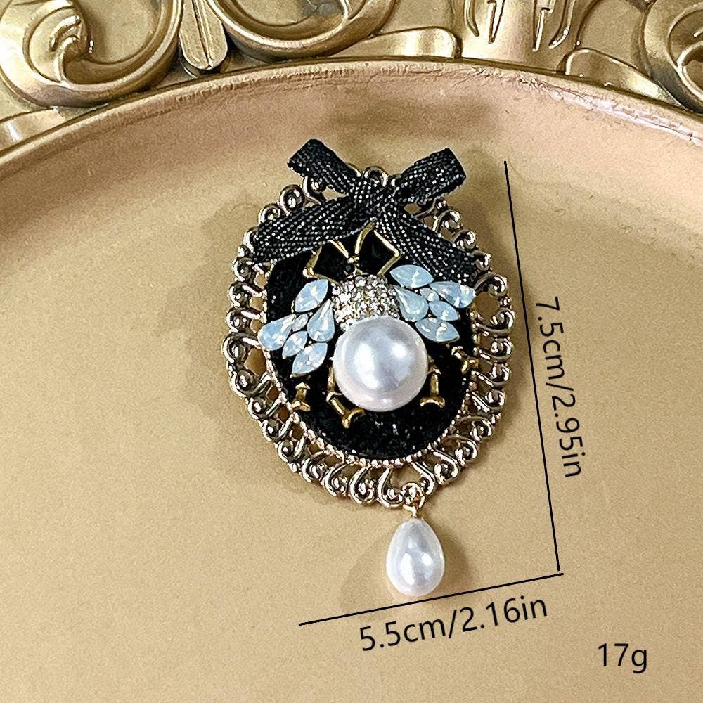 Elegant Black Bow Pearl & Crystal Decorated Brooch: A