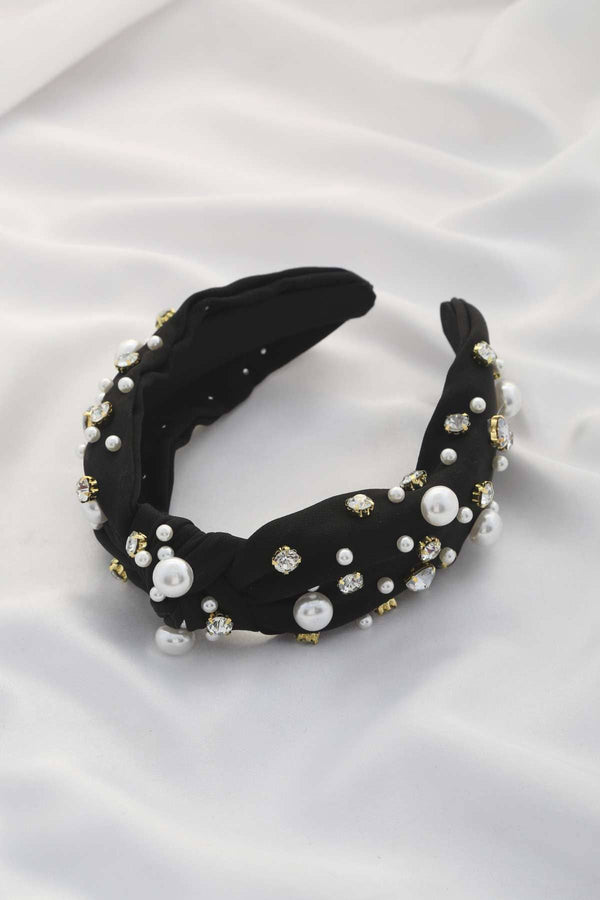 Black knotted headband with pearl and crystal embellishments — elevated loungewear styling