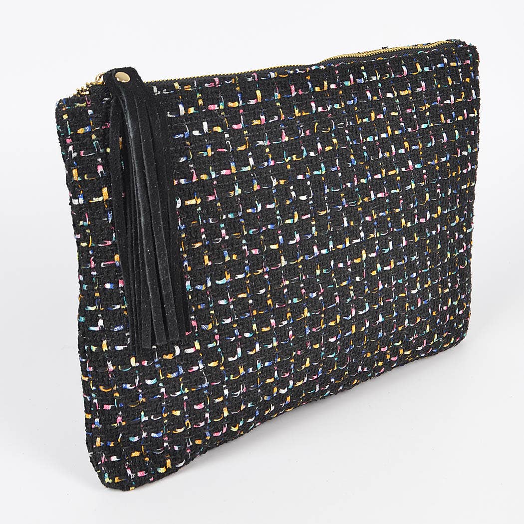 angled side view of black tweed pouch with black tassel against a white background