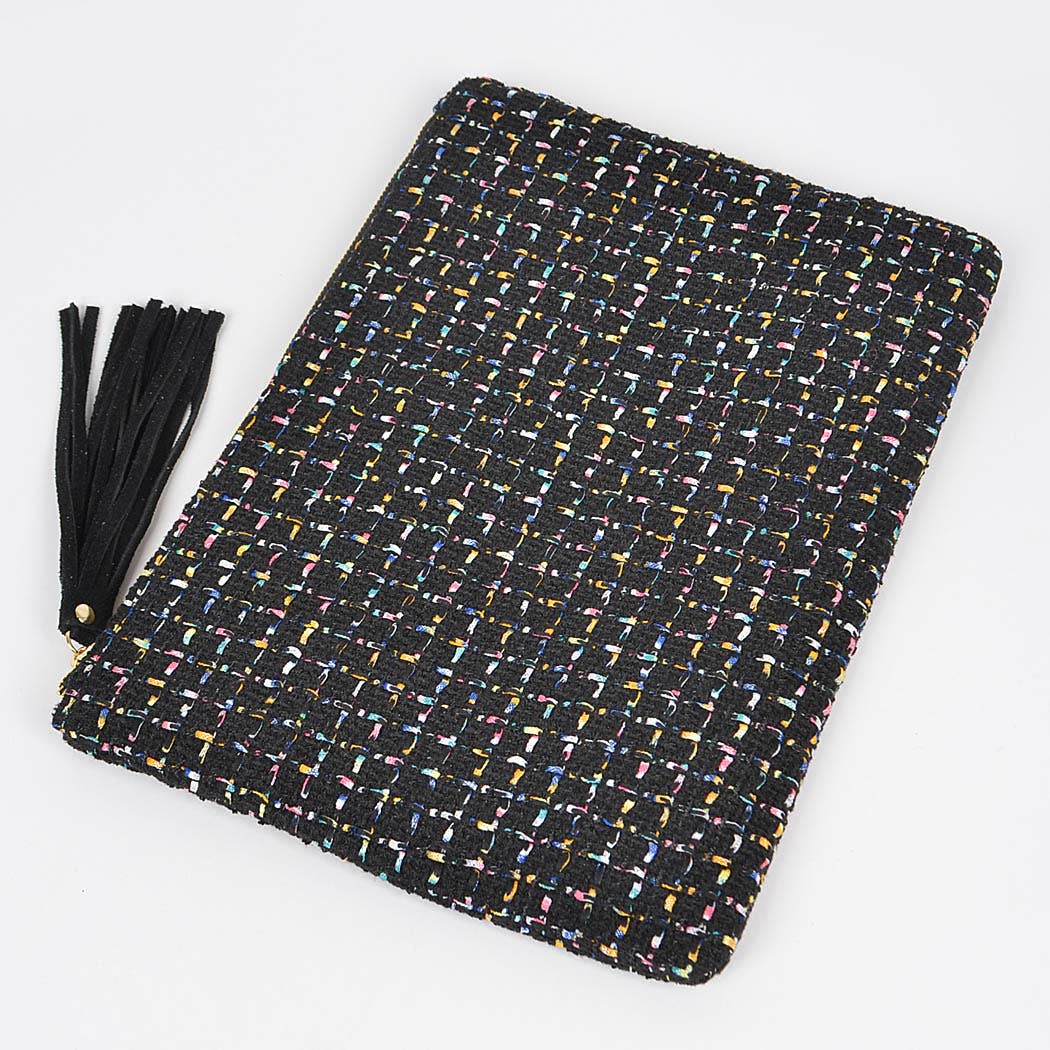 black tweed pouch with black tassel laying against a white background