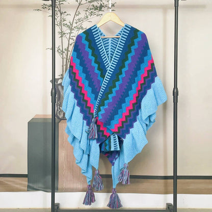 blue multi colored wrap handing on a hanger