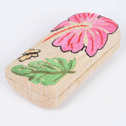 raffia purse with butterfly and floral embroidery on the front