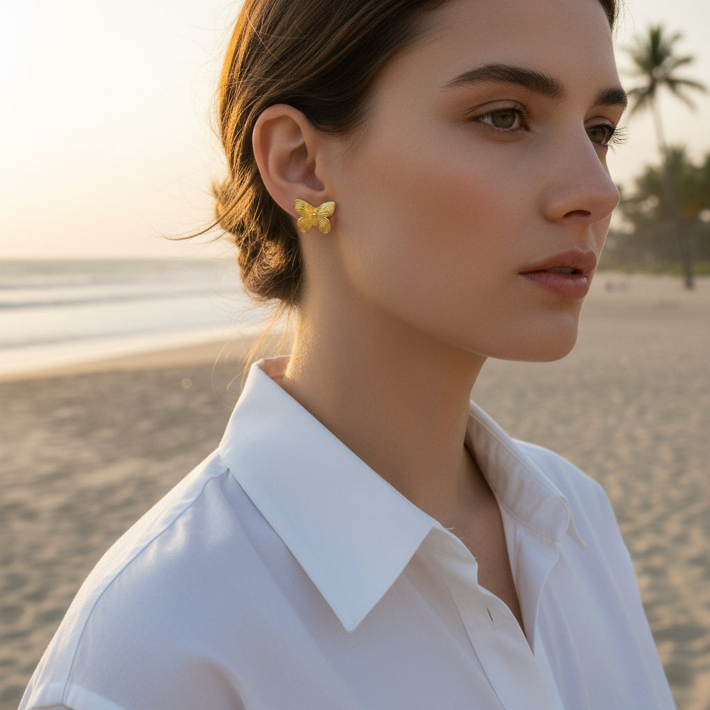 Gold butterfly stud earrings from JuJu Loves