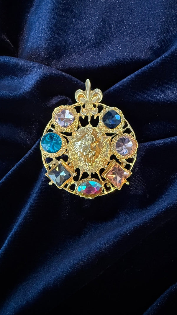 Gold filigree lion brooch with multicolor crystals and fleur-de-lis crown by JuJu Loves