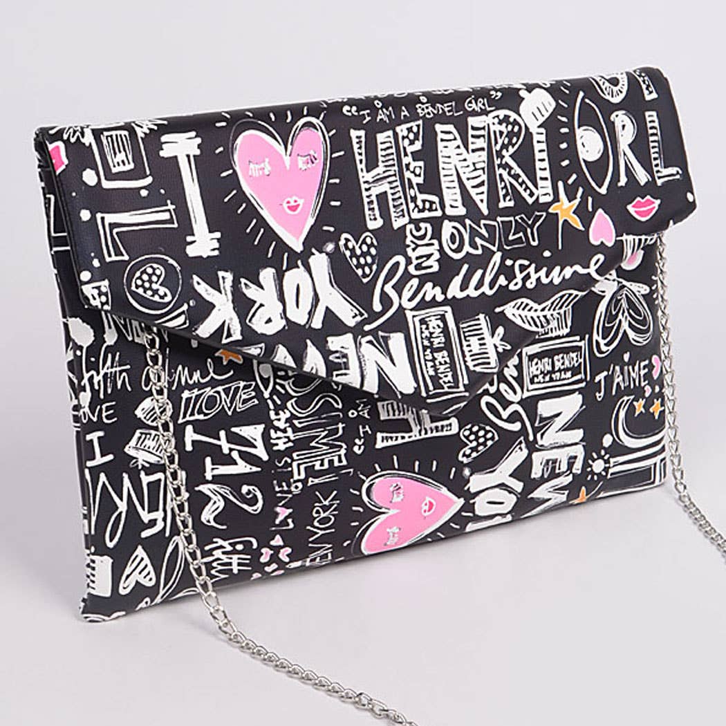 Graffiti print clutch with detachable chain strap — showing chain strap detail