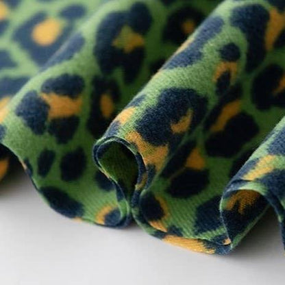 up close detail of green leopard print scarf