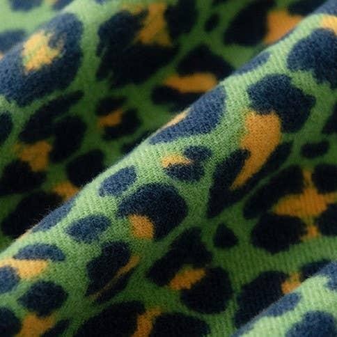 up close detail of green leopard print scarf