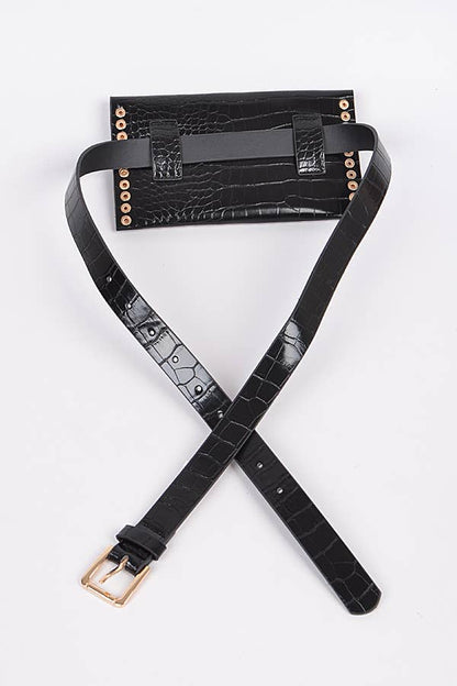 back view of black croc embossed faux leather waist bag showing removable leather strap against a white background