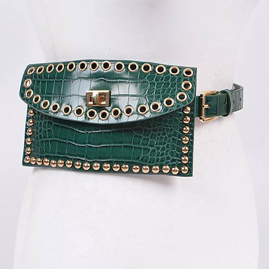 A green belt bag with studded detailing on a white mannequin.