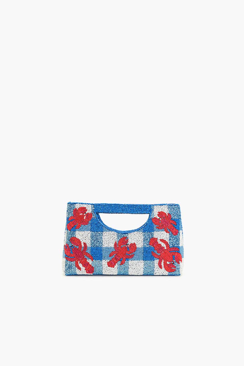 red sequin lobsters on a blue and white beaded bag against a white background