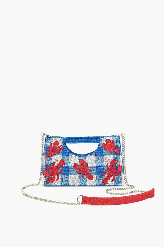 A blue and red beaded clutch with a geometric pattern and a nickel-finish chain strap.