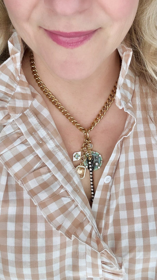 Enamel and crystal multi-charm pendant necklace with arrow disc diamond and crystal charms in antique gold