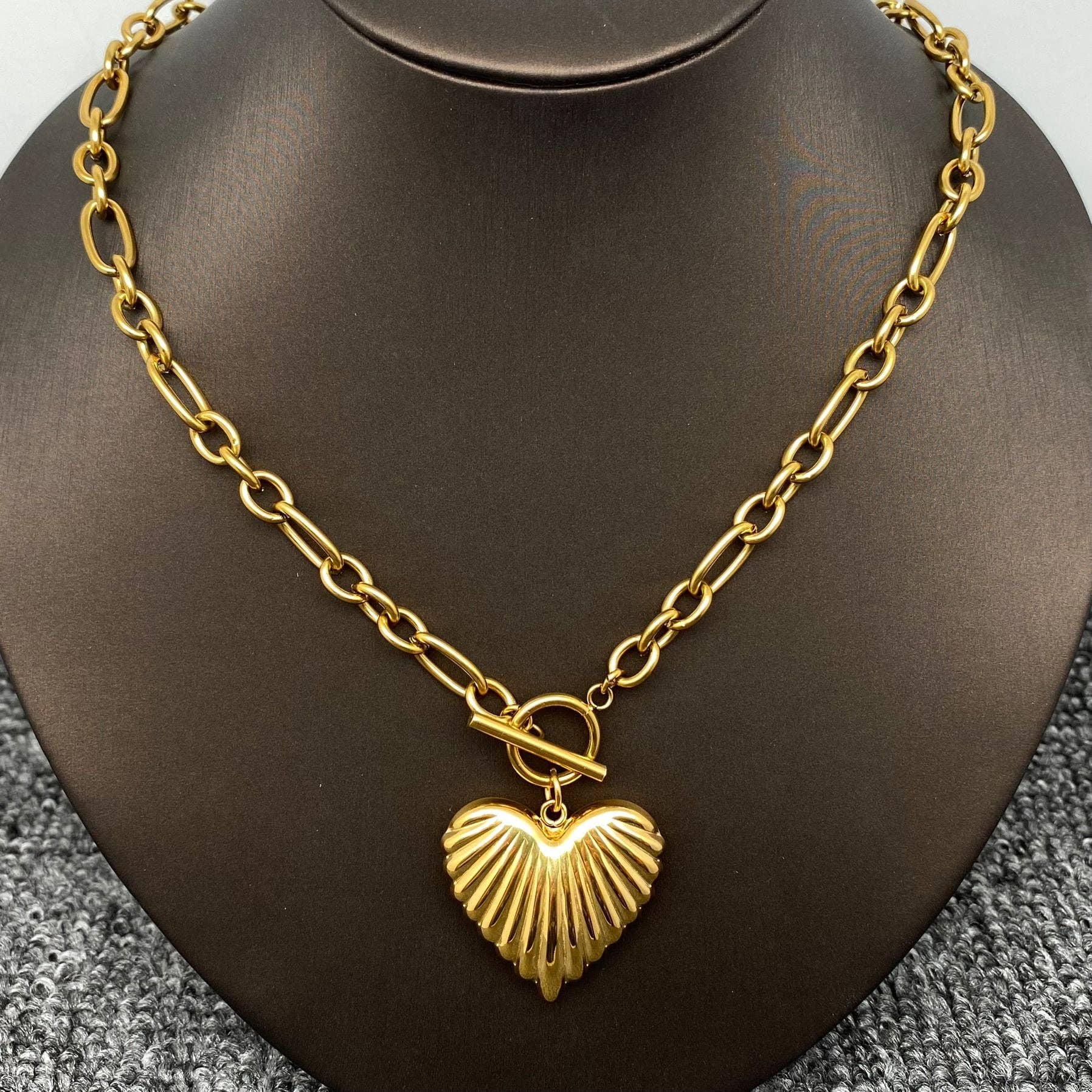 Gold puffy heart charm necklace 