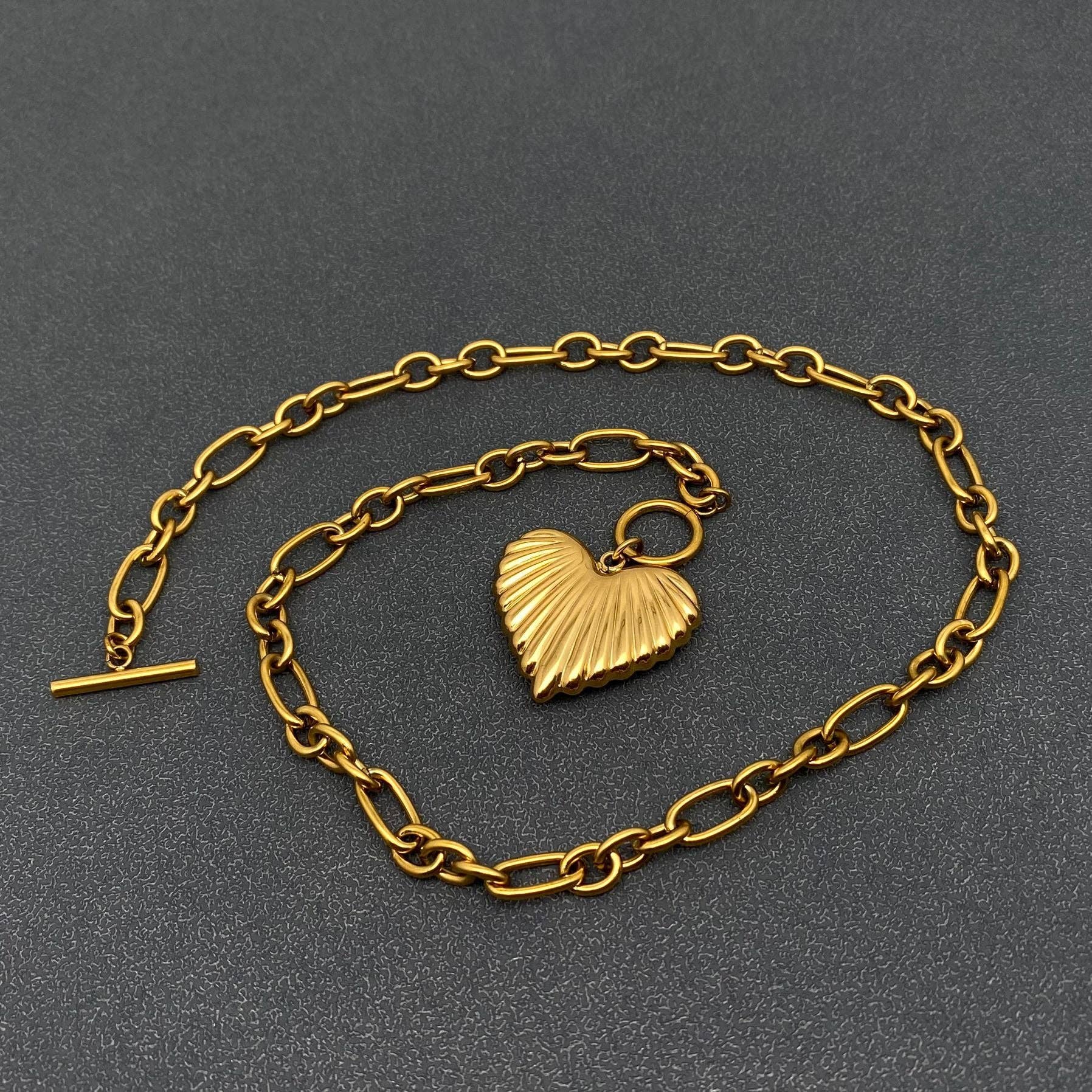 Gold puffy heart charm necklace 