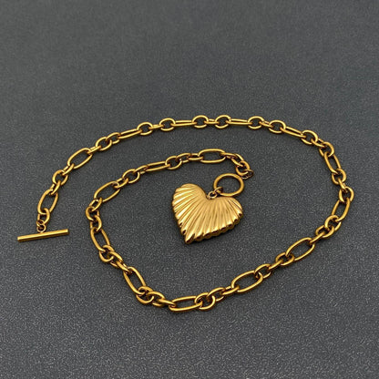 Gold puffy heart charm necklace 