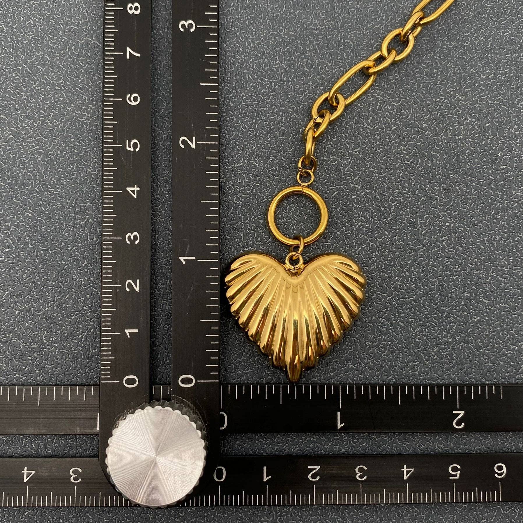 Gold puffy heart charm necklace with ruler