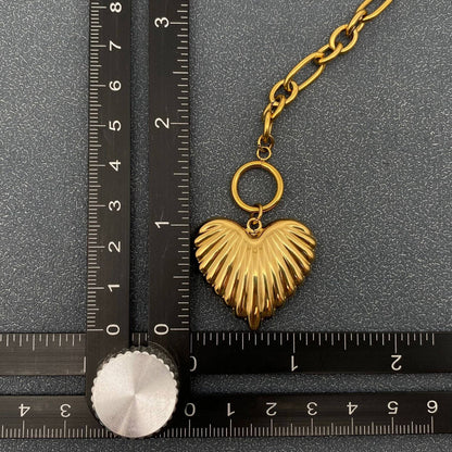 Gold puffy heart charm necklace with ruler