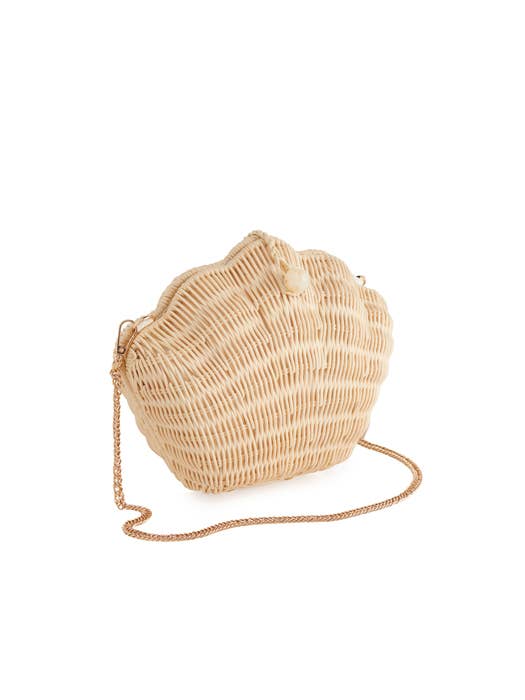 Woven straw bag with a string on a white background