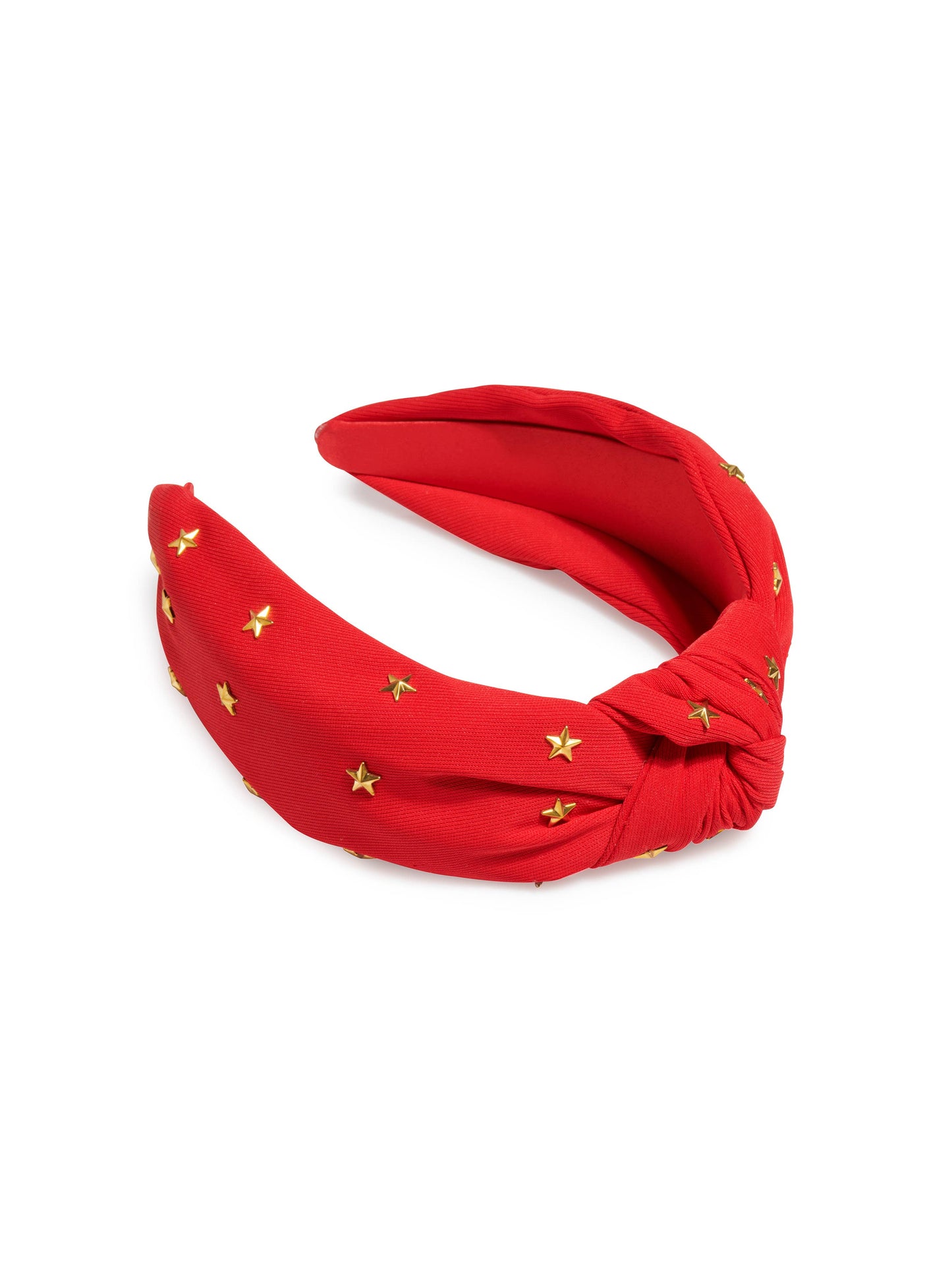 A red headband with gold stars against a white background