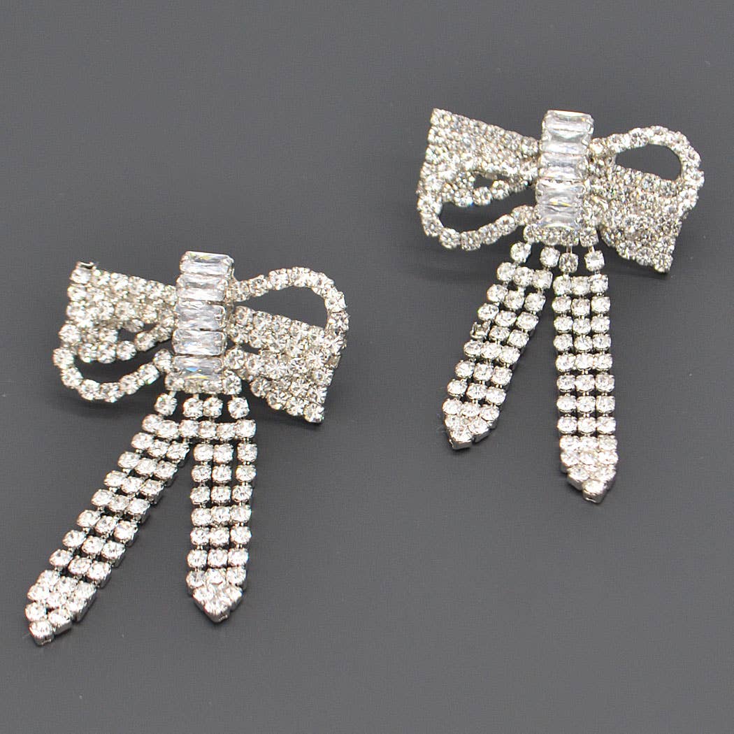 a pair of ribbon rhinestone earrings 