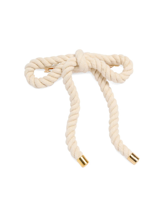 a beige rope bow hair clip against a white background