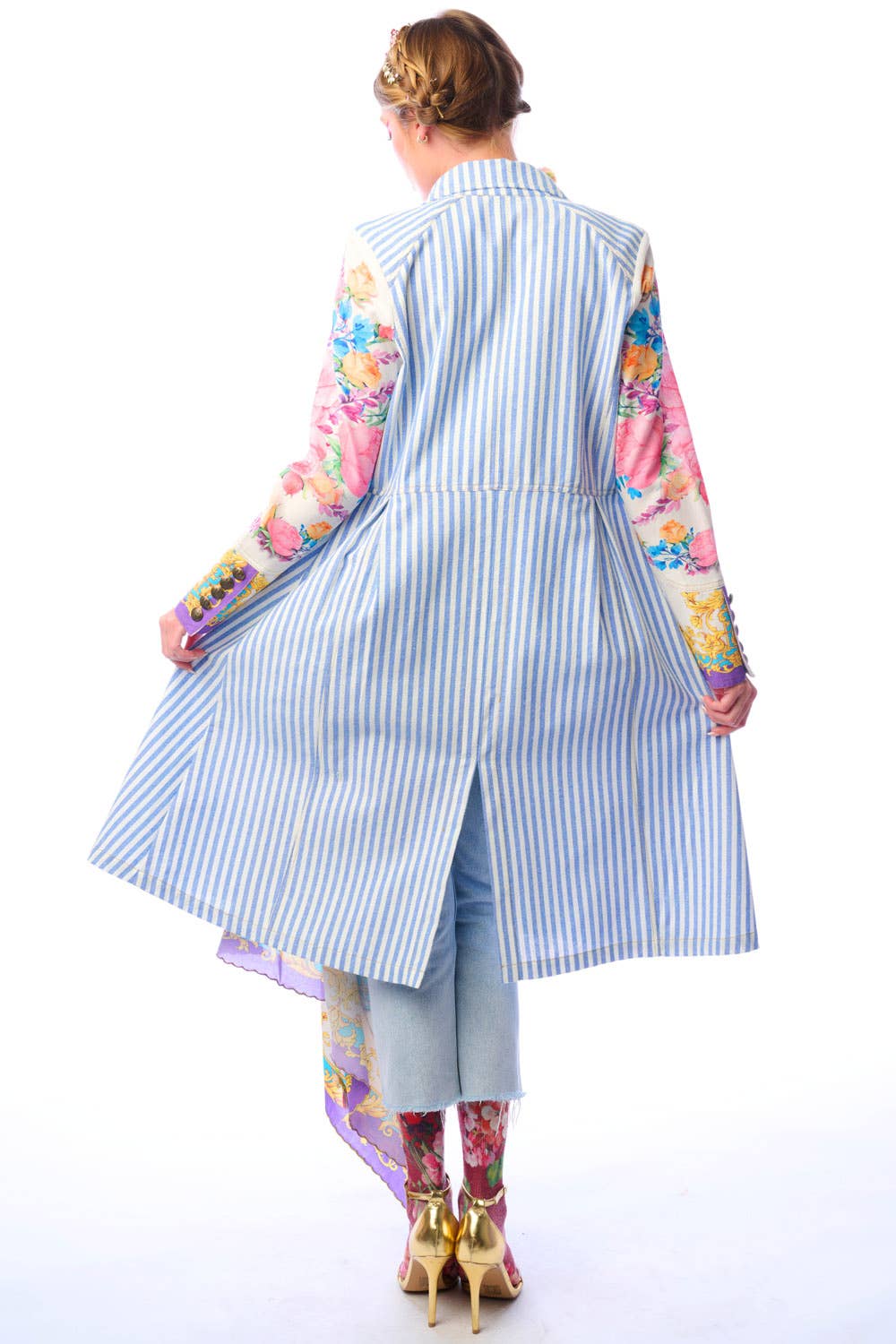 Back view of striped floral sleeve coat showing contrast print sleeves and back hem slit on a white background