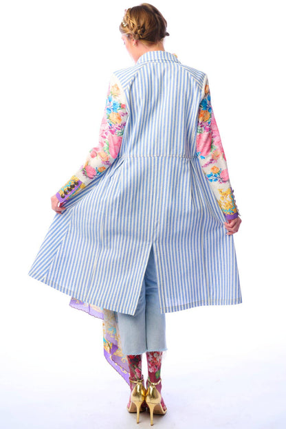Back view of striped floral sleeve coat showing contrast print sleeves and back hem slit on a white background