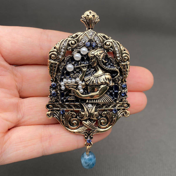Vintage princess carriage brooch with scrollwork details and navy blue crystals — JuJu Loves