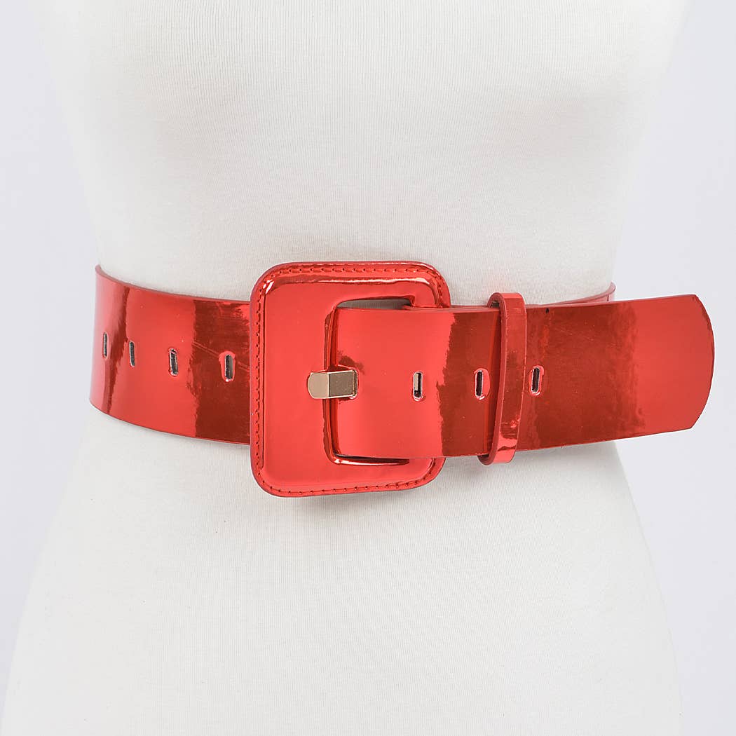 A red wide mirror belt with a square buckle, displayed on a mannequin against a white background.