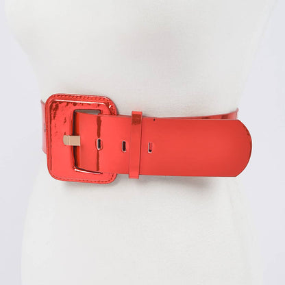 red wide mirror belt on a mannequin against a white background